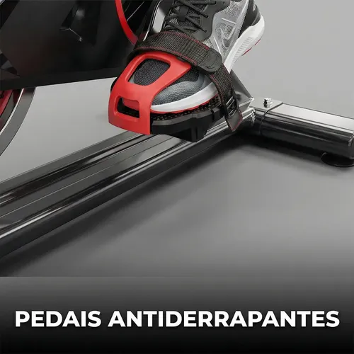 Bicicleta Sevenfit preta e vermelha, com ajustes de selim e guidão indicados pelo anúncio. — imagem complementar
